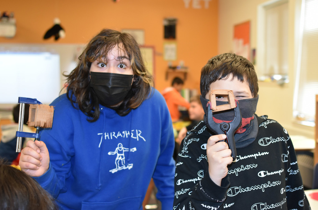 students showing off their bentwood boxes