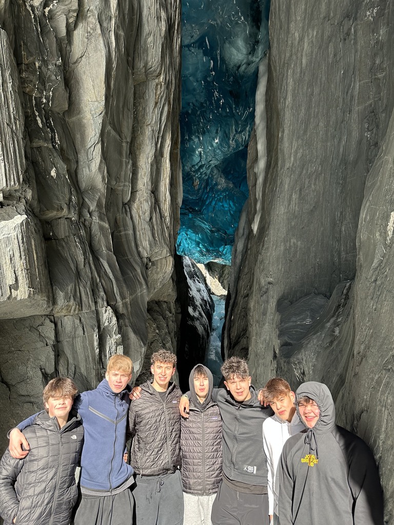 students in front of glacier