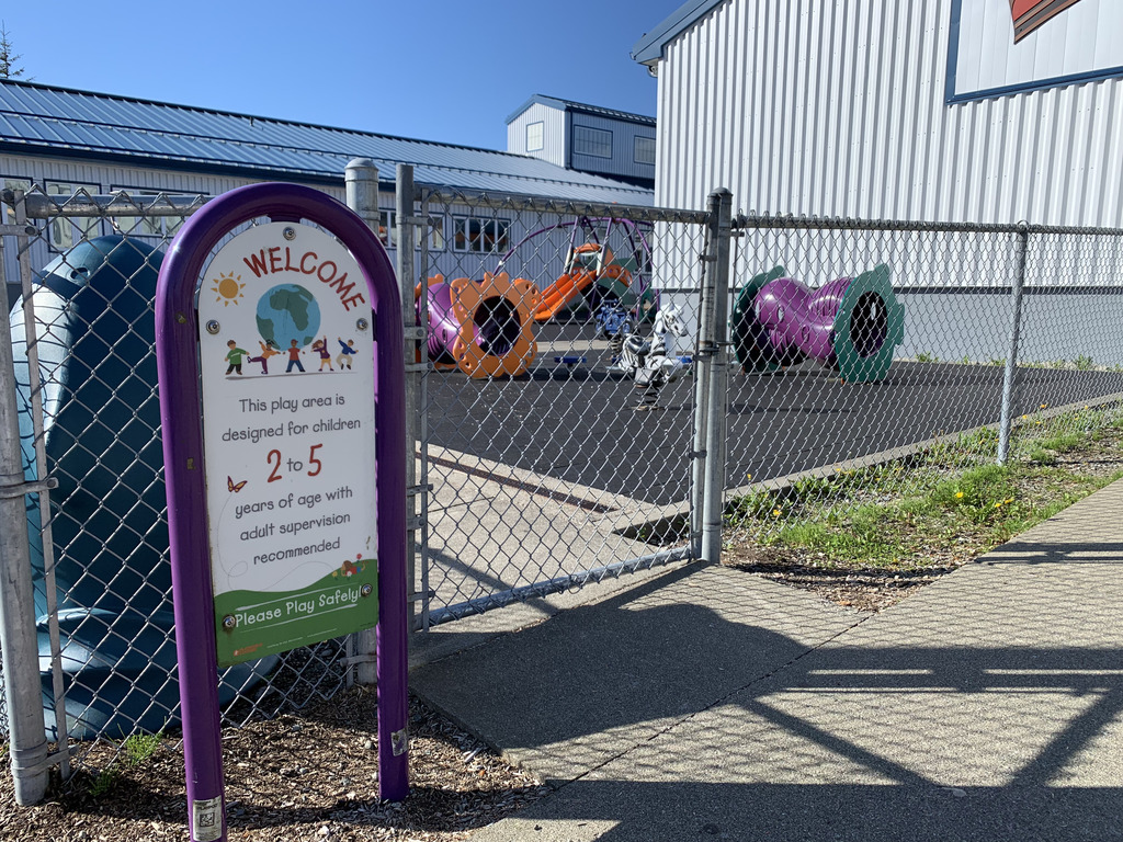 sign with playground at school