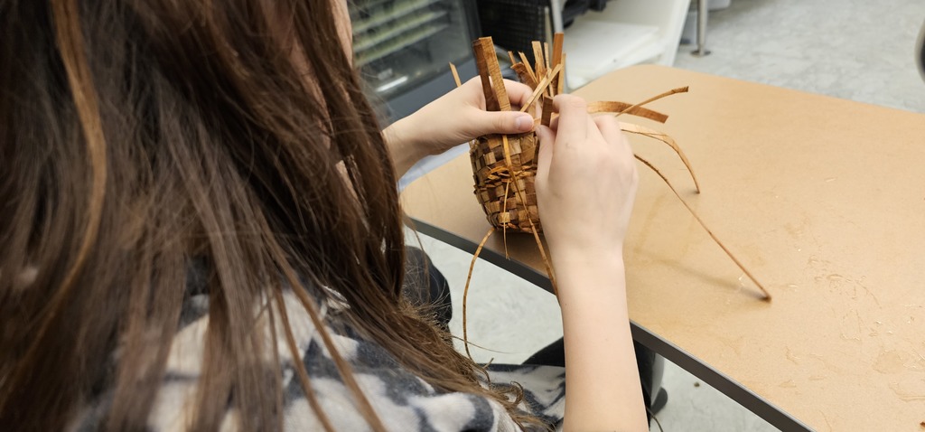 student weaving